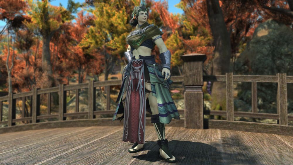 Juniper as a Roegadyn. She's posed with her right hand on her hip and her left hand relaxed on her side. Her face is the "d'ya like Jazz" face from A Bee Movie. She's standing on a bridge in the North Shroud with fall-colored trees in the background. 