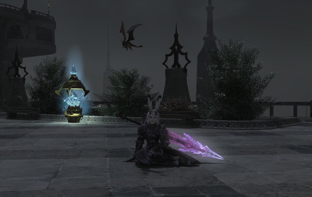 A white haired viera female in full dark purple armour seated on the ground, there is a large purple glowing sword on her back and fog in the sky.
