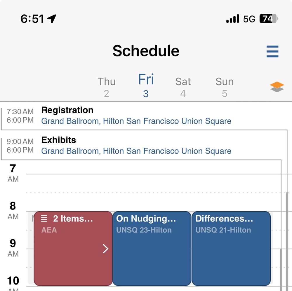 Picture of a conference schedule with four 8am sessions bookmarked.