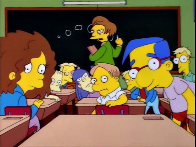 Frame from The Simpsons where everyone turns around to look at Bart after a bad take. 