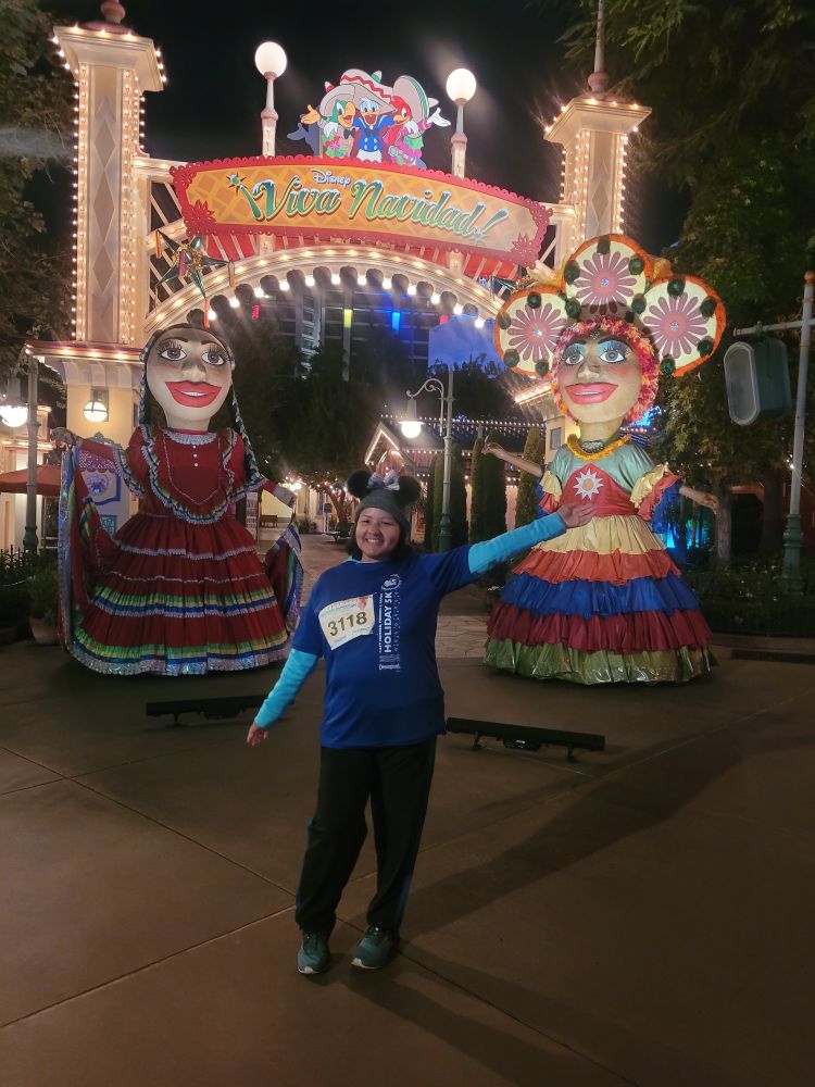 Me in front of the Mexican and Brazilian parade floats from ¡Viva Navidad! in DCA. 