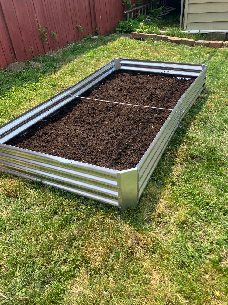 A metal planter ready to go for next year’s strawberries. 