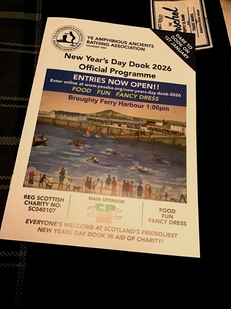 Official programme for the New Year's Day Dook 2026 organised by Ye Amphibious Ancients Bathing Association (founded 1884). Entries Now Open! Food Fun Fancy Dress! 1st January at Broughty Ferry Harbour 1pm. A painting on the front shows brave souls swimming in the chilly water with spectators watching from the harbour front.