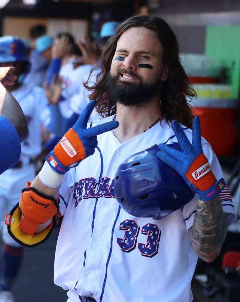 Jesus Christ wearing a Syracuse Mets jersey