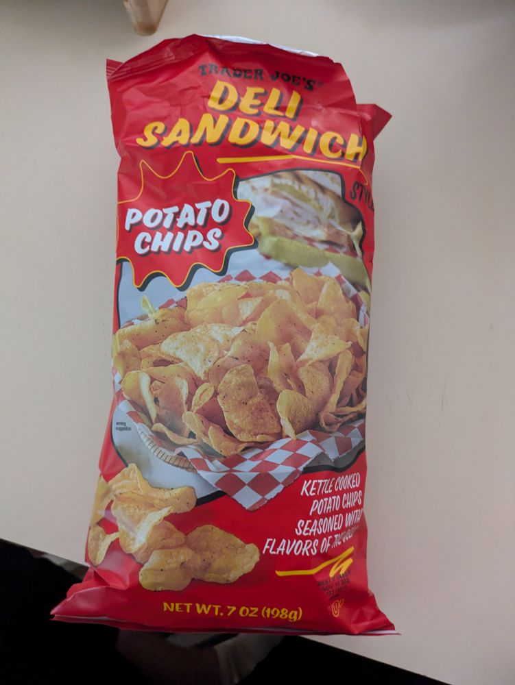 A red bag of deli sandwich flavored potato chips