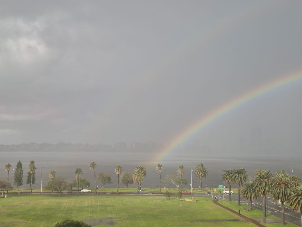 Rainbow over a river.