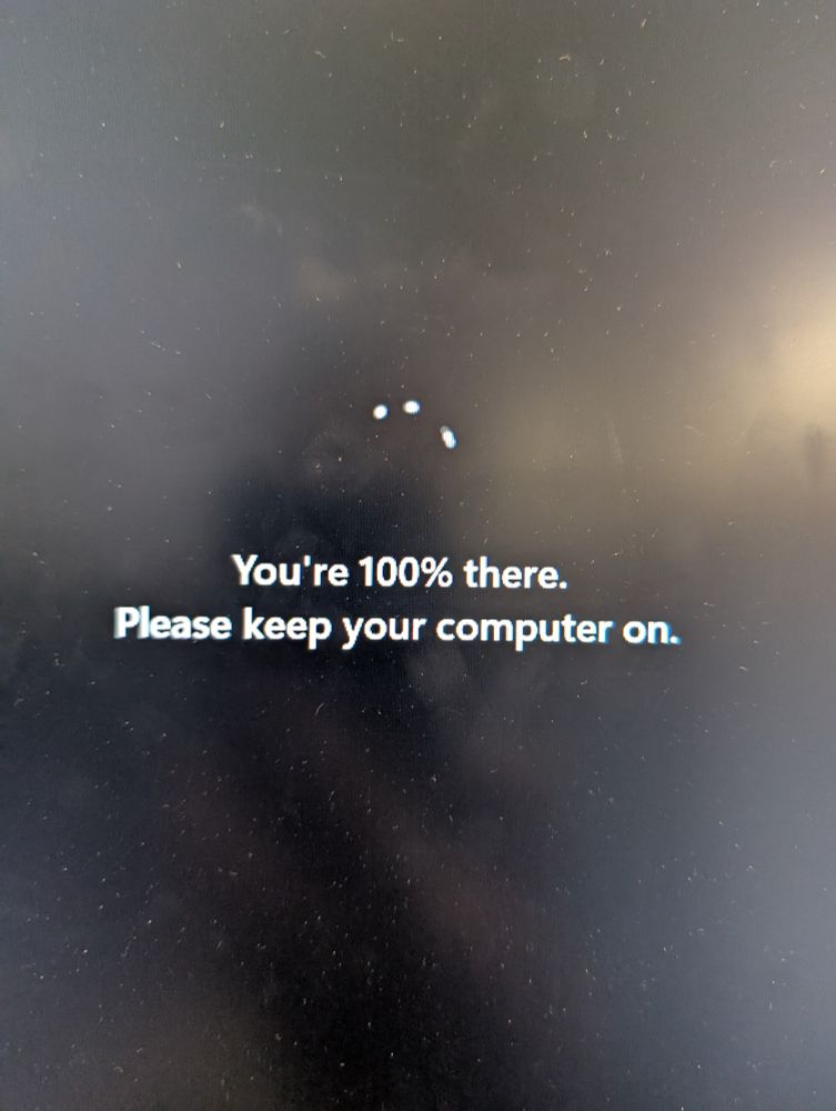 "You're 100% there. Please keep your computer on." A sublime and poetic Windows update message.