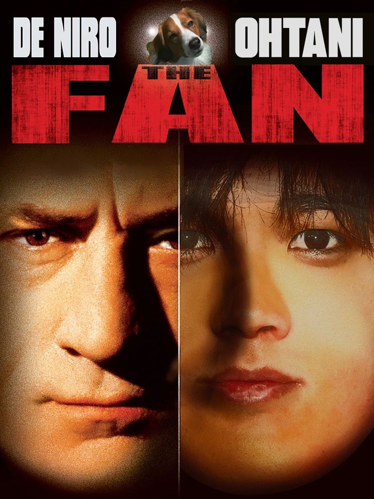 Poster for upcoming remake of The Fan. Split screen image of the two co-stars's faces on a black background with Robert De Niro on the left and Shohei Ohtani opposite. Decoy the Dog is up top, sandwiched between the last names of our two stars with the film's title, "THE FAN" centered below in large red text.