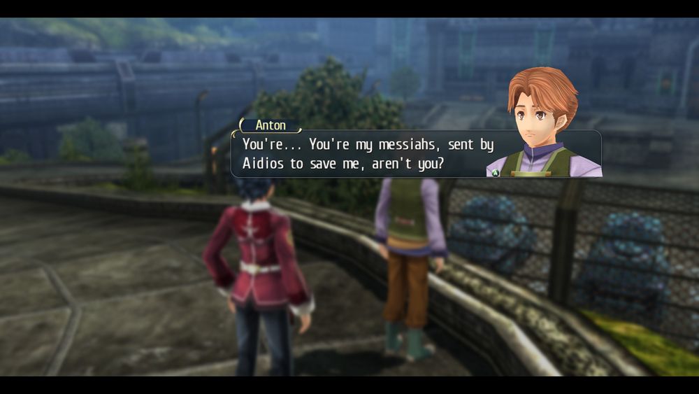 Screenshot from Trails in the Sky featuring Rean Schwarzer (left) and an NPC Anton (right, obscured by a textbox/accompanying head), mildly blurred out. 

TEXTBOX TITLE: Anton

TEXTBOX BODY: You're...You're my messiahs, sent by Aidios to save me, aren't you?
