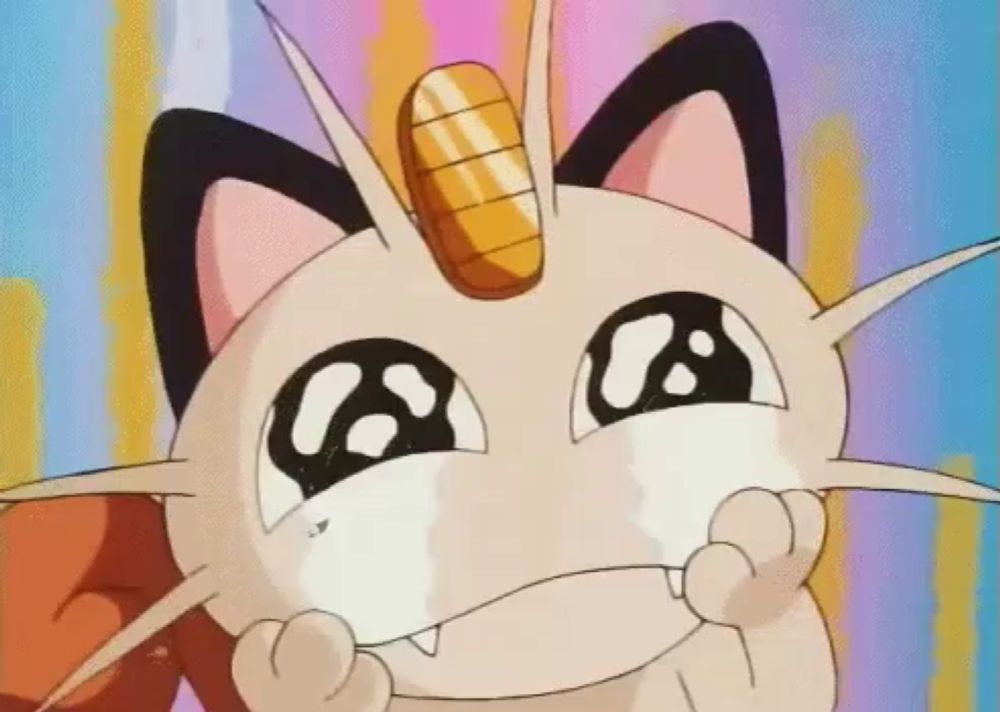 a cartoon cat with a golden horn on its head is crying