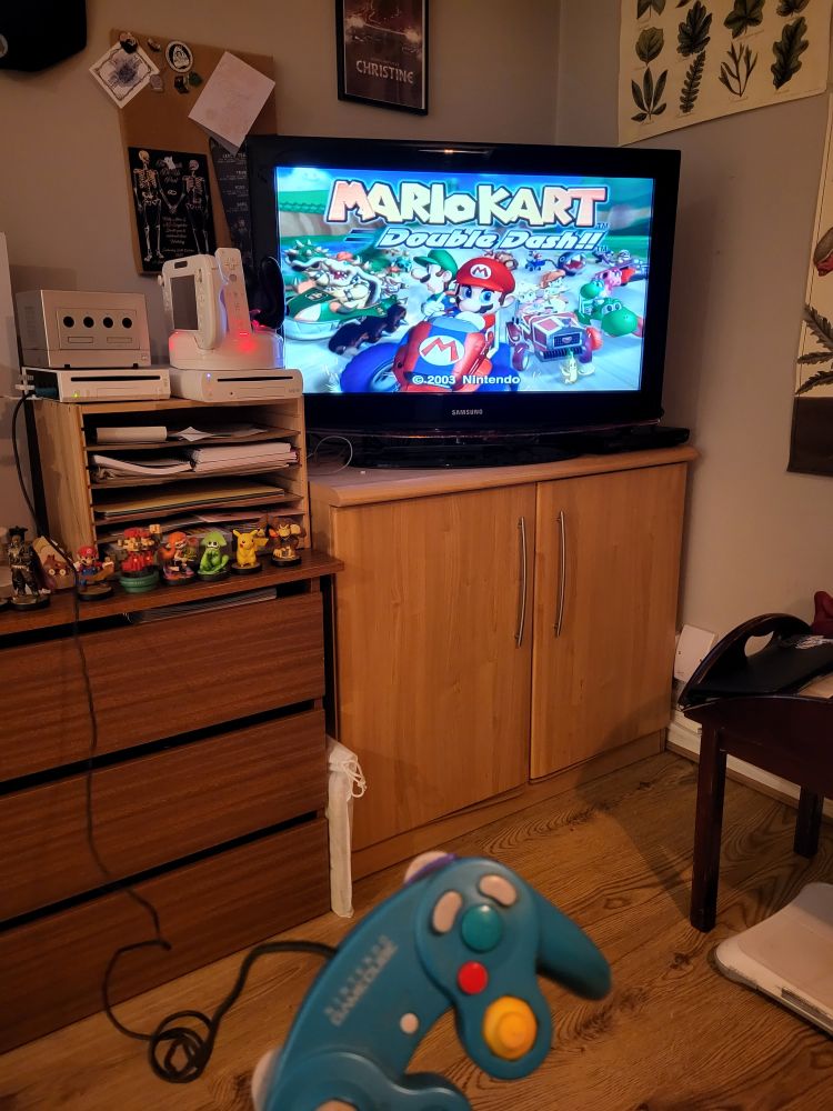 The Game Cube is mostly decorative at this point. It turns on, but it won't read discs 😭