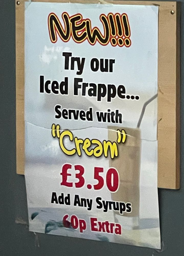 Poster that says : NEW!! Try our Iced Frappe... Served with 
