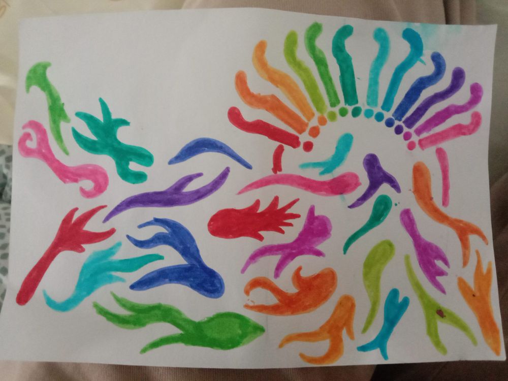 tailed colourful shapes in a stream entering a doorframe with twelve rainbow hands raying out of it