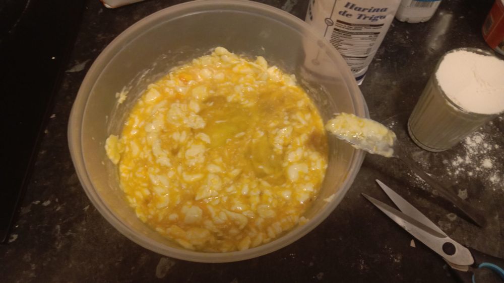three eggs mixed with butter (and honey), the substance having a significant grainy-composite texture to it
