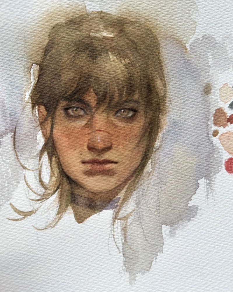 Sciel from Clair Obscur: Expedition 33. A light brown-haired woman with bangs and strands of hair framing her face. There's a scar running across her nose. 