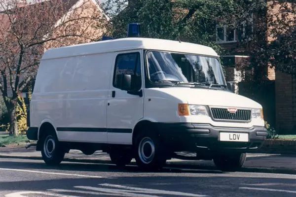 A white LDV van, front three quarters, parked in a suburban road.