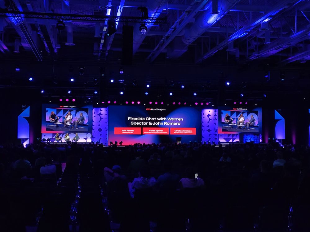 The "We Are Developers World Congress" Main stage with "Fireside Chat with Warren Spector & John Romero" moderated by Christian Heilmann.