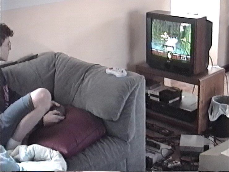 Photo of Benj Edwards (age 13) playing Doom on the Atari Jaguar on Thanksgiving 1994