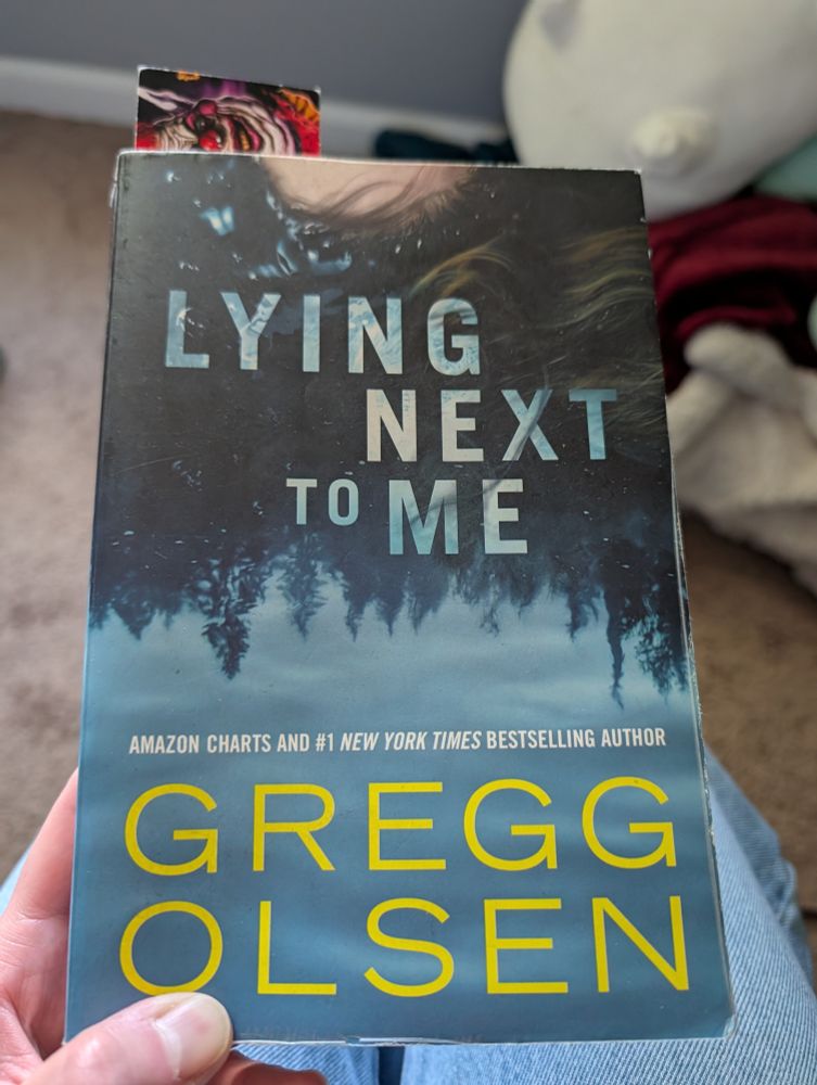 photo of the book titled lying next to me by author Gregg Olsen 
