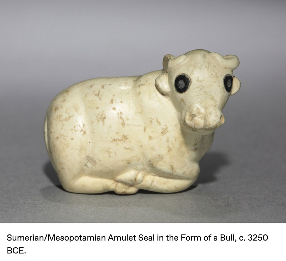 A Sumerian/Mesopotamian amulet seal in the form of a very cute white bull with big eyes. 
