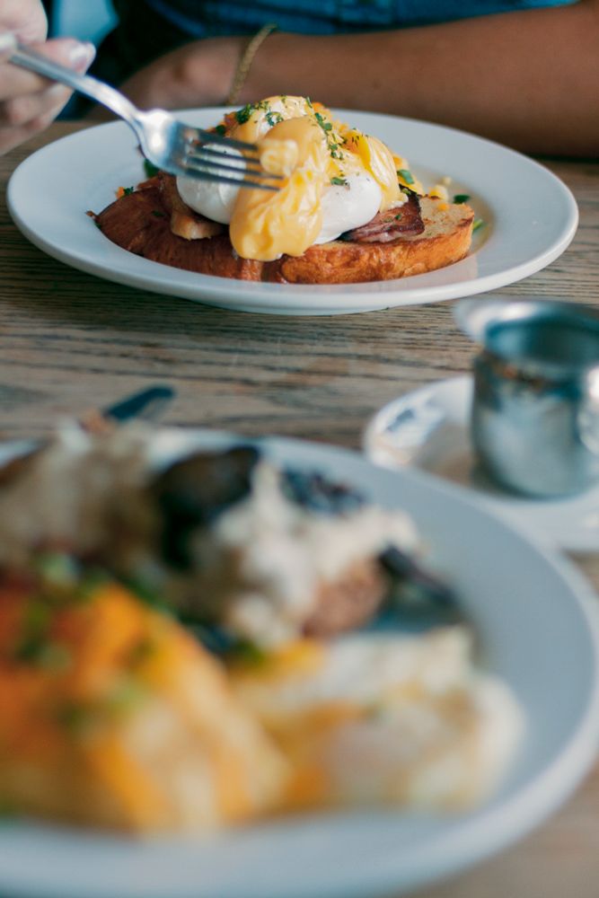 Breakfast!  A buttermilk country-fried steak, and eggs Benedict, both with cheddar and bacon grits.
