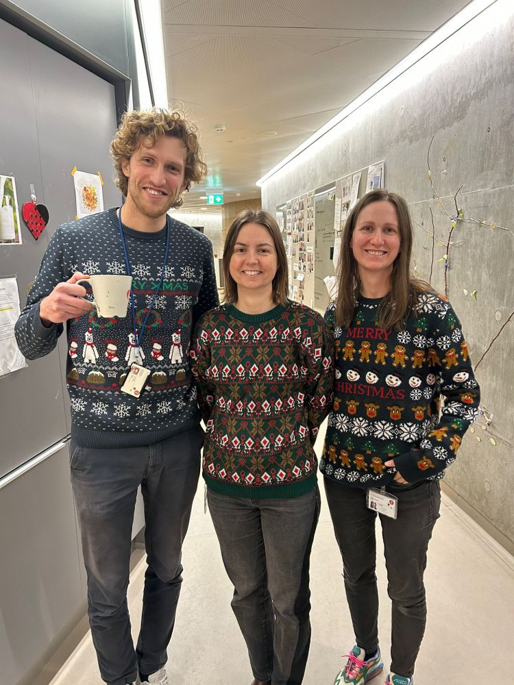 Me and two colleagues in Christmas sweaters 