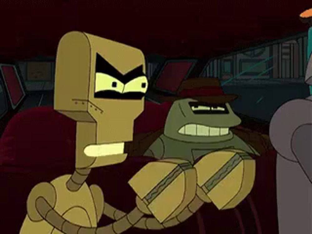 two cartoon robots are standing next to each other in a dark room