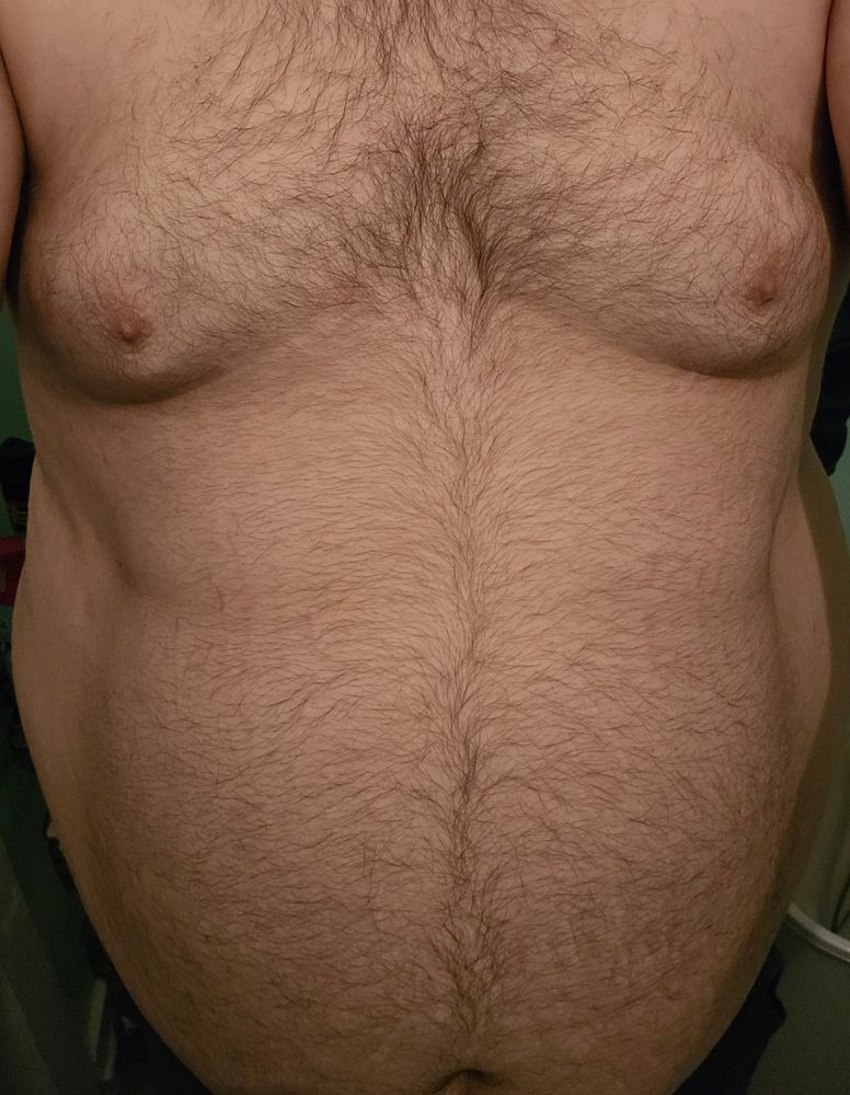 My half naked body showing off my hairy belly and moobs
