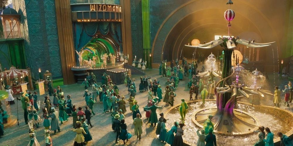 A wideshot view of a pedestrian plaza in the city of Oz from the movie Wicked.