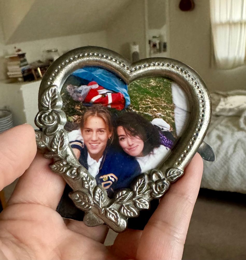 Heart frame with picture of me and my cross country coach 