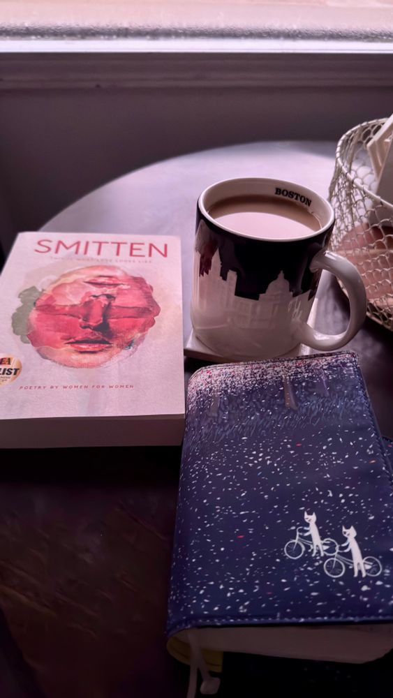 Journal book and coffee on dining room table 