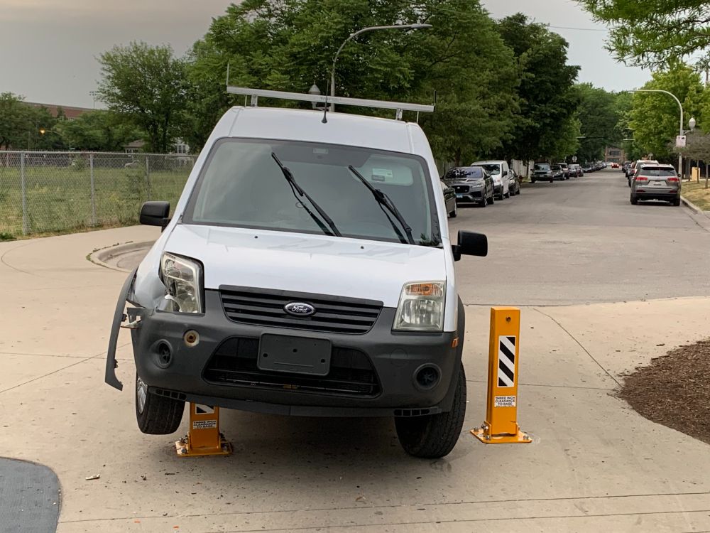 The western entrance to the 606 Trail. The bollards stopped the car and prevented it from damaging anything.