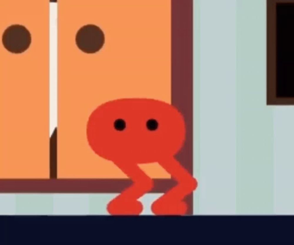 a red cartoon character is standing in front of a closet