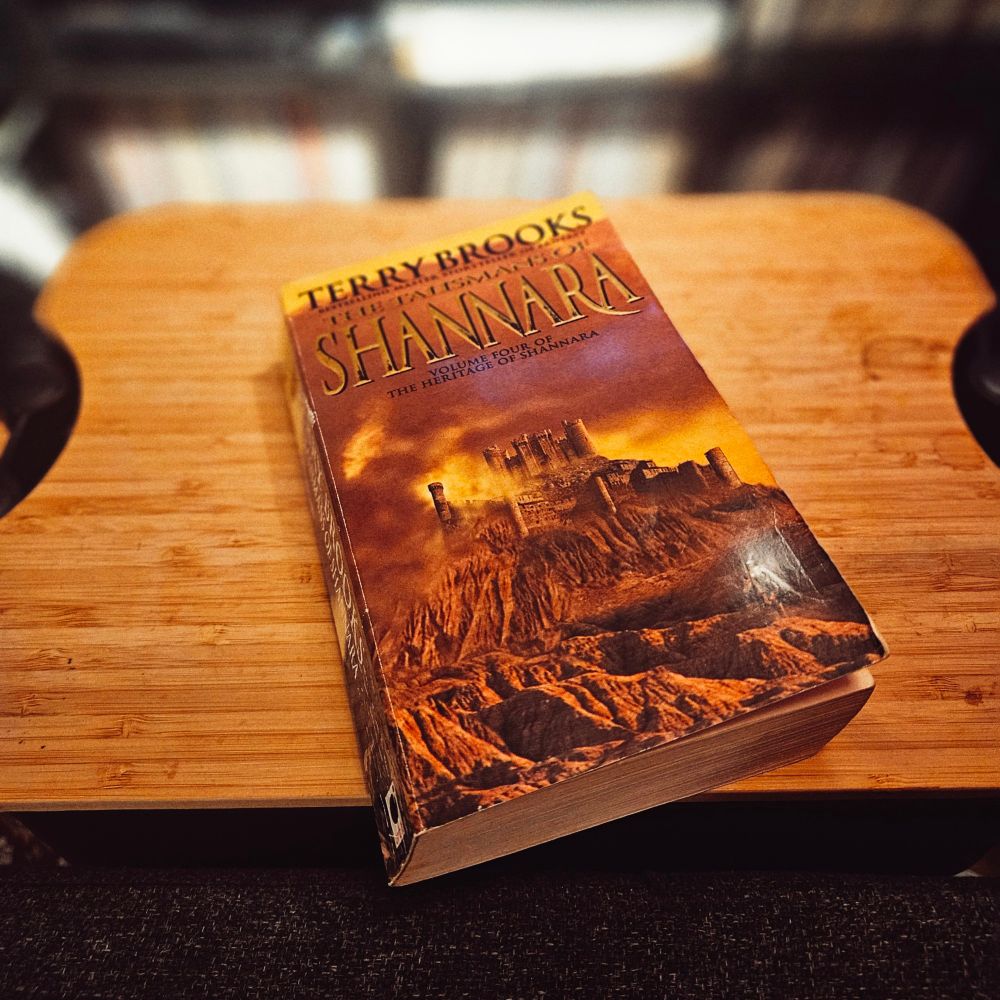 A photograph of a paperback copy of The Talismans of Shannara by Terry Brooks 