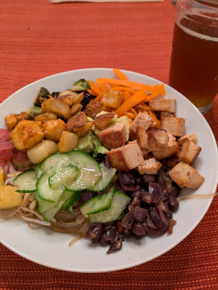 Bowls with purple rice, glass noodles, veg