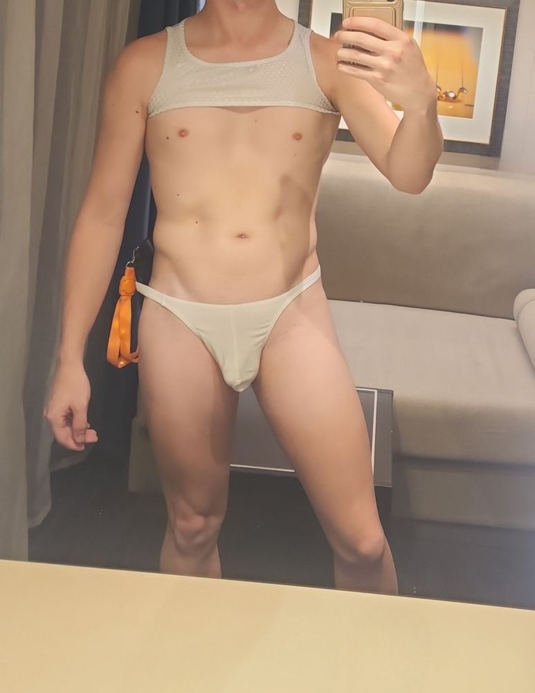 Me in a white harness and thong for white party