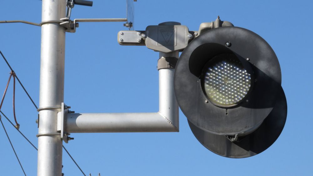 A lit grade crossing indicator (aka G.C.I.)