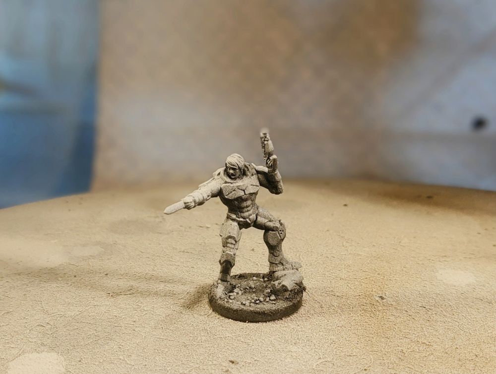 Enforcer from Mantic Games converted to fit the pose shown on the artwork