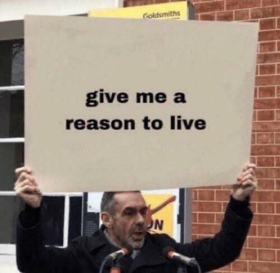Man with a sign that says 