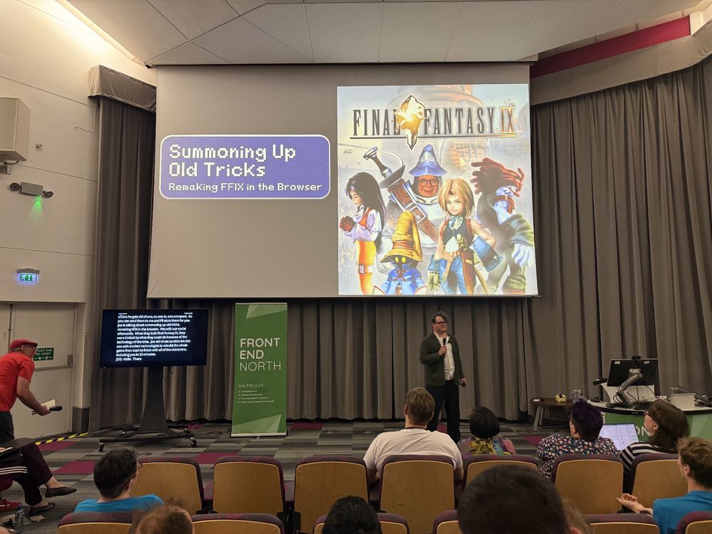 joe hart on stage at frontend north, their title slide reads: Summoning Up Old Tricks Remaking FFIX in the Browser