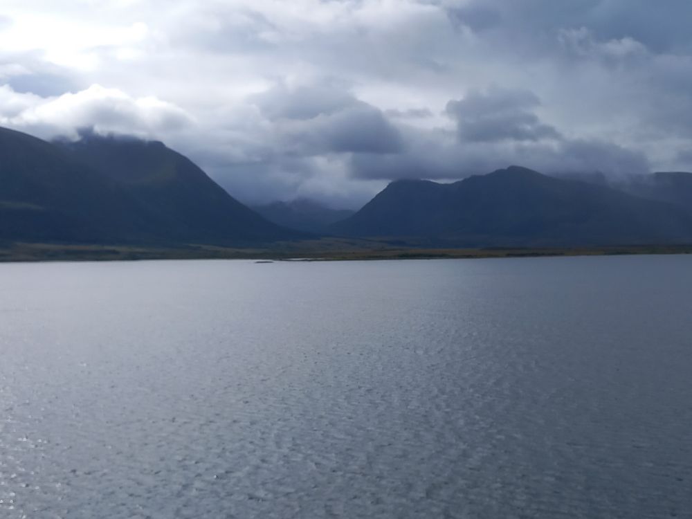 Mountains on islands in Norway with dark clouds