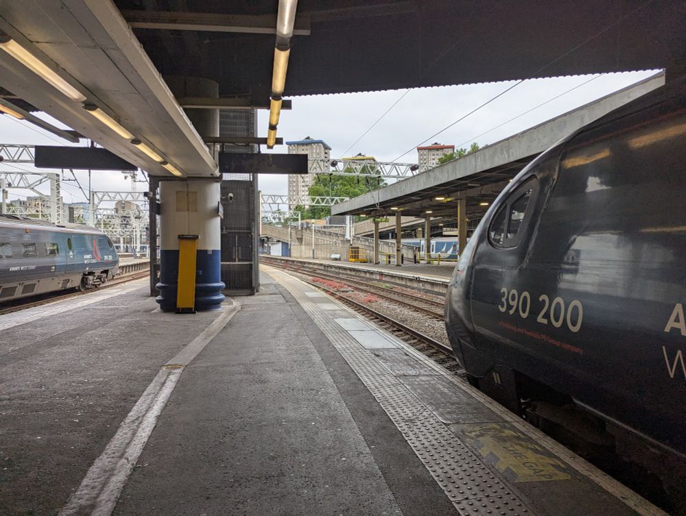 A pair of class 390s at London Euston, both carrying the number 390 200