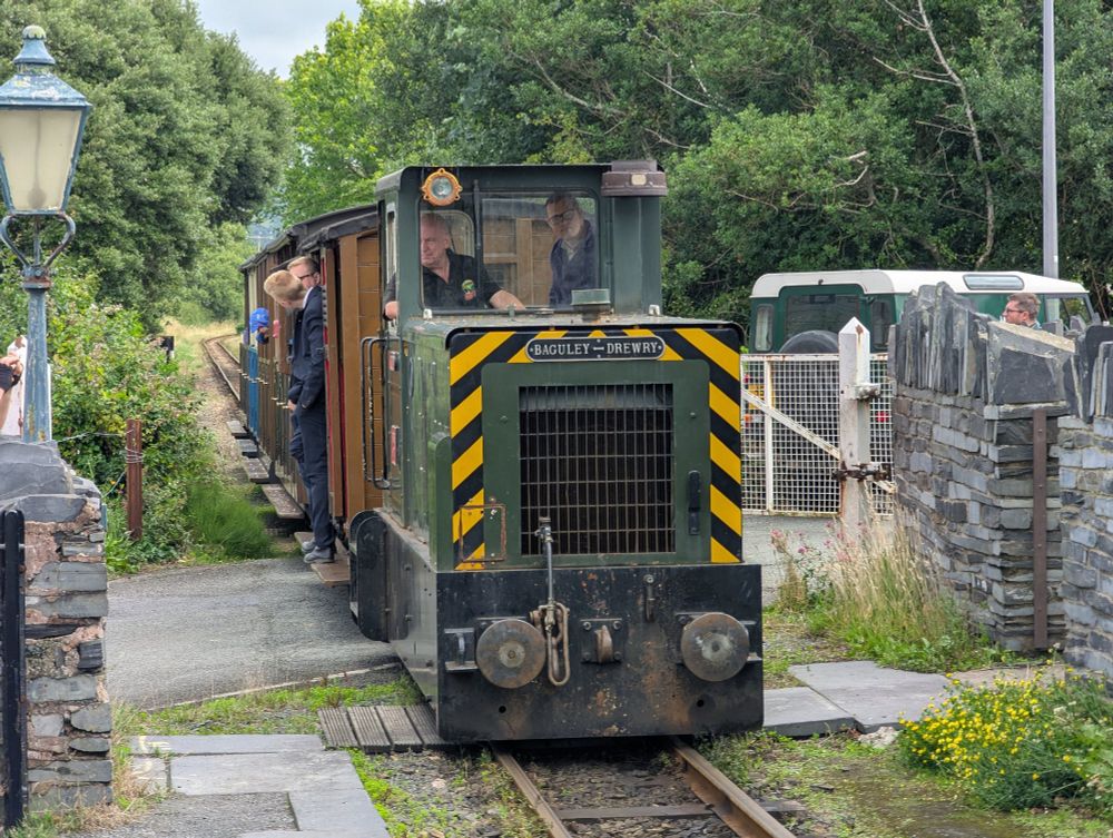 No.11 pulls a passenger train into Pendre over the level crossing 