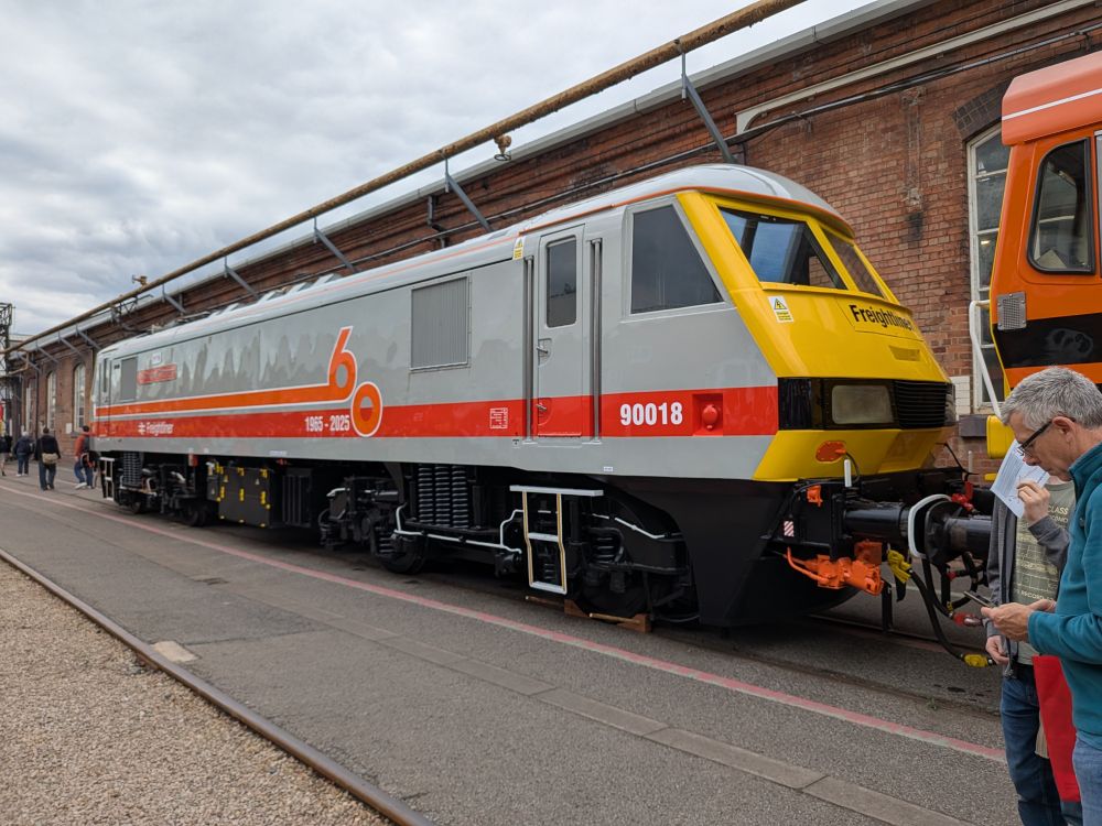 Class 90 018 in a special livery for the company's 60th anniversary 