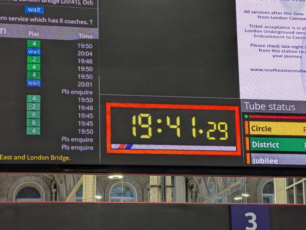 A new style LED departure boards at Charing Cross with a clock designed to look like the old NSE ones