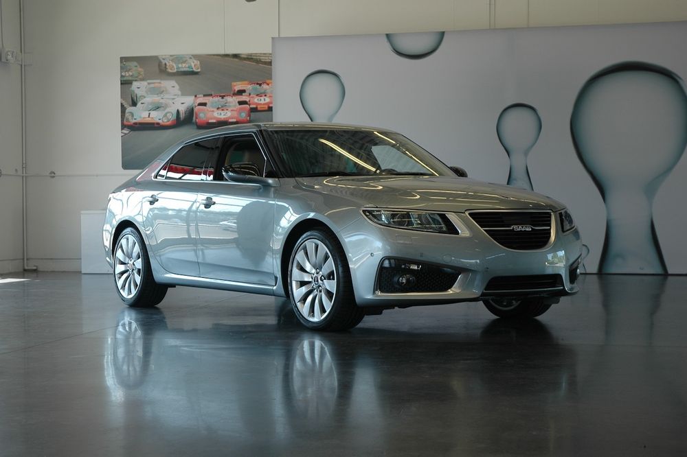 Unveiling of the all-new and soon to be forgotten 2nd gen Saab 9-5, in an appropriately boring silver, parked inside the Monticello Motor Club clubhouse garage. Attendees immediately fell asleep.