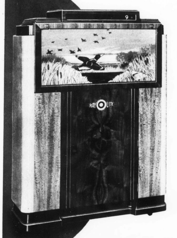 1937-05 Machine Design pg 45. A Seeburg Ray-O-Lite Rifle Range cabinet.