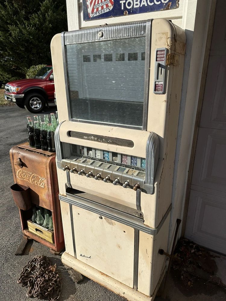 1940s era cigarette vending machine.

https://www.ebay.com/itm/176160554714