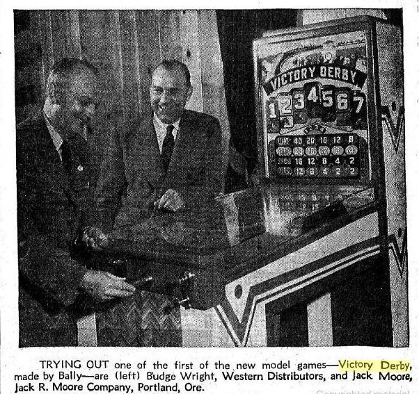 1946-01-26 The Billboard pg 96. Two distributors play Victory Derby in the showroom of Jack R. Moore Co in Portland, OR.