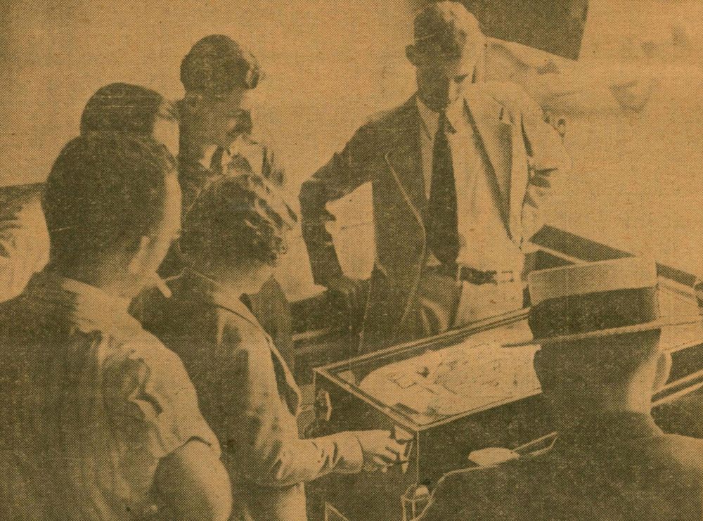 1934-06 Pacific Coin Machine Review pg 10. A woman plays a pinball machine as others watch.